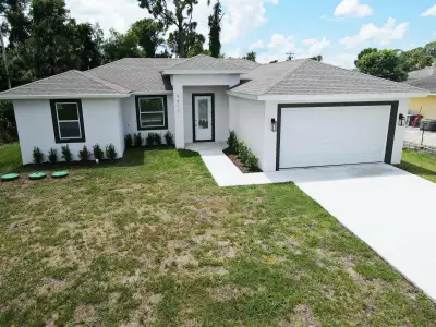 New construction Single-Family house 2617 10Th St W, Lehigh Acres, FL 33971 - image