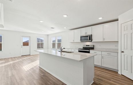 Ample cabinet space in kitchen *real home pictured