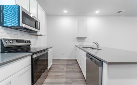 Municipal Drive Townhomes by CastleRock Communities in Leander - photo 6 6