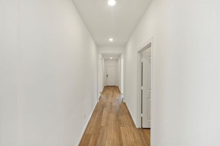 Corridor featuring light hardwood / wood-style floors