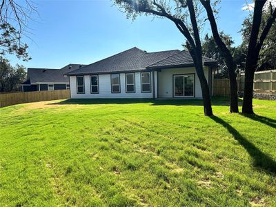 View of front of house featuring a front lawn