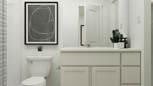 Bathroom featuring toilet and vanity