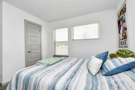 Different angle of the first bedroom towards the front of the house