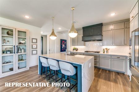 The kitchen of your dreams is waiting for you in Estates at Stacy Crossing!  REPRESENTATIVE PHOTO