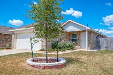 The fully landscaped yard adds to the charm of this home, providing great curb appeal with minimal maintenance required.