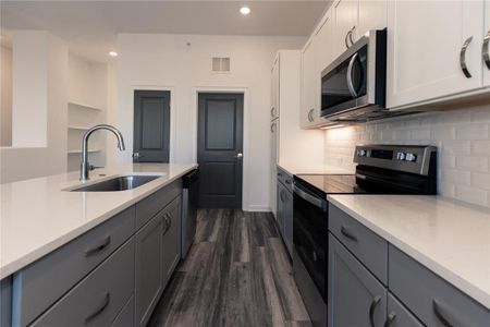 Enjoy additional storage with a walk in pantry plus powder room located on main level living keeping owners bathrooms private *Home is Under Construction. Photos shown are from other TPG Communities to display how the home will live*