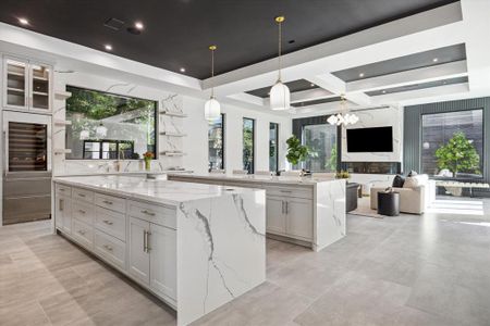 Spectacular Gourmet Kitchen with dual islands, abundant storage and quality appliances