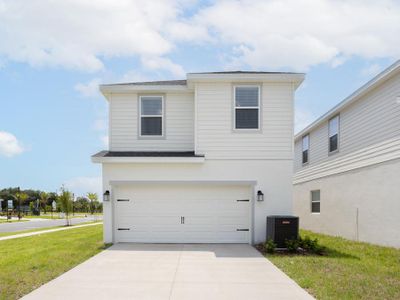 Attached 2-car garage located on the rear of the home with alley access - Aria home plan by Highland Homes