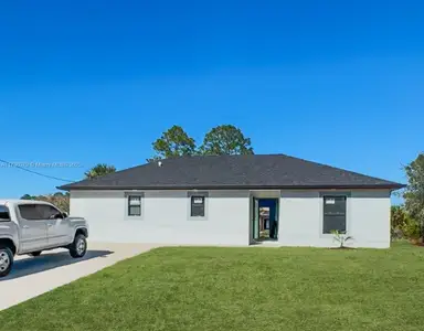 New construction Single-Family house 202 Hagan St S, Lehigh Acres, FL 33974 - image