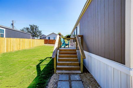 Nice size decks on both sides of home.