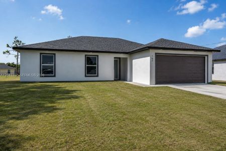 New construction Single-Family house 702 Carbon St, Lehigh Acres, FL 33974 - image