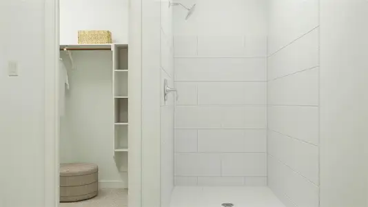 Bathroom with tiled shower