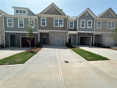 New construction Townhouse house 5734 Calle Vista Drive, Lithonia, GA 30058 McAfee- photo 0