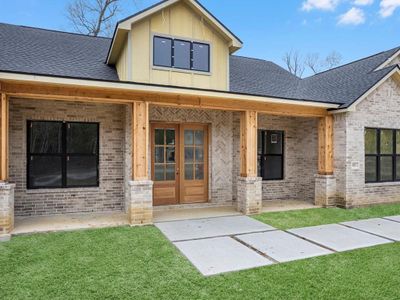 Oversized windows offer style and functionality to this beauty!