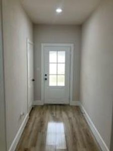 Entryway featuring wood-style flooring