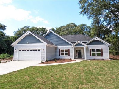 New construction Single-Family house 915 W Poplar Street, Griffin, GA 30224 - photo 0