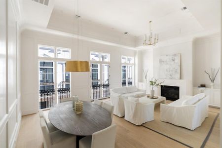 The thoughtful floor plan in the second floor living area is idea for both small-scale family living and grander entertaining. (photo of interior model home with smaller floor plan)