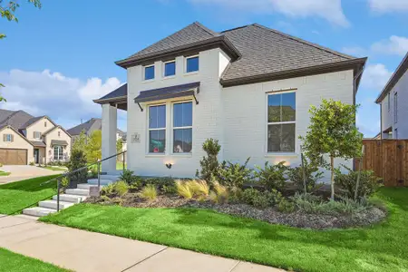 View of front of property with a front yard