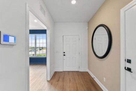 Photo of Pulte model home with same floor plan, not of actual home listed.