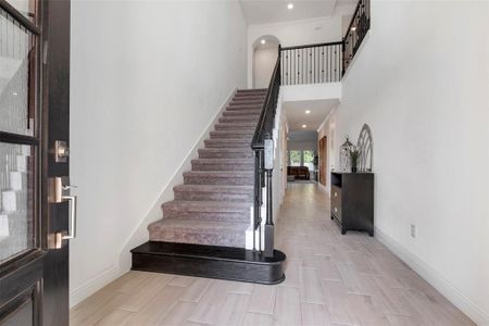 Elegant entry with tile floors.