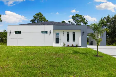 New construction Single-Family house 1221 Ederle St E, Lehigh Acres, FL 33974 - image