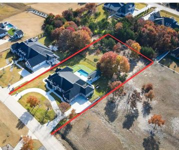 Aerial view of the home and lot.