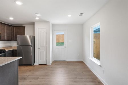 Dining room featuring light wood-style floors