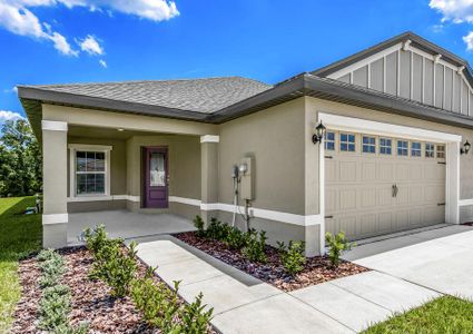 Exterior photo of the Egret with a large covered front porch