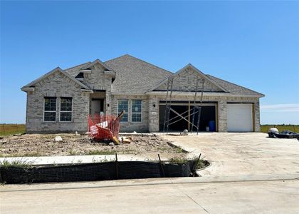 One-story home with 4 bedrooms, 3.5 baths and 4 car tandem garage