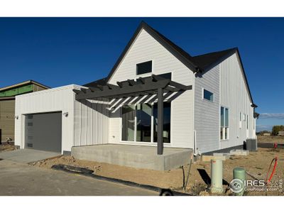 Two Car Garage on Alley and West Facing Patio off Main Living Area