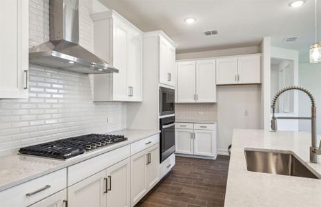 Bright kitchen with premium appliances *real home pictured