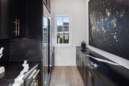 Kitchen featuring light hardwood / wood-style floors and a wealth of natural light