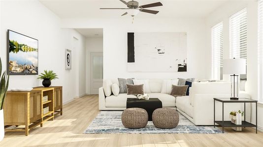 Living room featuring ceiling fan and light wood-type flooring