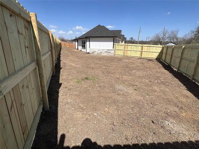 View of yard featuring a fenced backyard