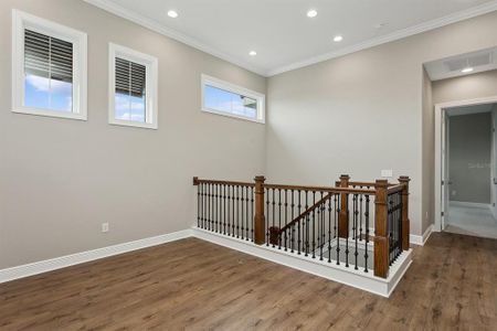 All windows have wood jambs (sides) & pictured framed casing. Crown in second floor loft.