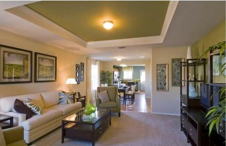 Photo of Pulte model home with same floor plan, not of actual home listed.