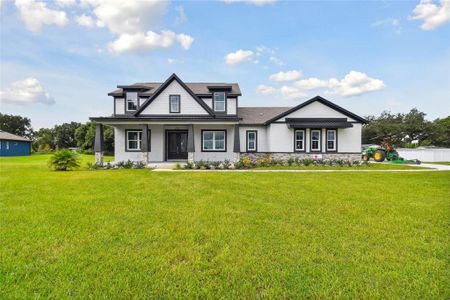 New construction Single-Family house 13541 Grand Blossom Court, Dover, FL 33527 - photo 0