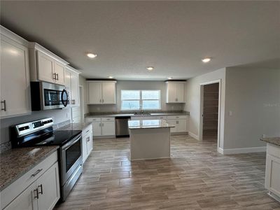 New construction Single-Family house 5280 Tennessee Ridge Ct, Auburndale, FL 33823 3000- photo 9 9