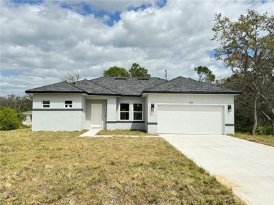 New construction Single-Family house 403 Caribbean Court, Poinciana, FL 34759 - photo 0