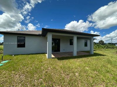 New construction Single-Family house 1051 Eisenhower Blvd, Lehigh Acres, FL 33974 - image