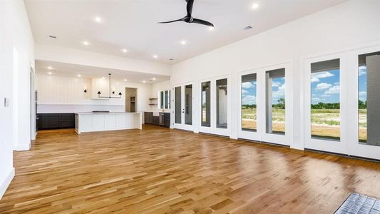 Unfurnished living room with light hardwood / wood-style flooring