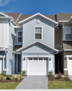 New construction Townhouse house 1309 Stockwell Avenue, Saint Cloud, FL 34771 - photo 0