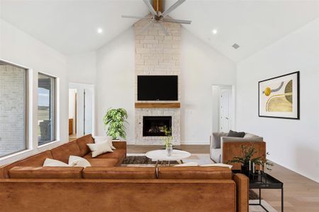 Floor to ceiling stone fireplace. Virtually Staged