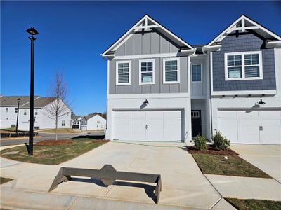 New construction Townhouse house 2484 Honey Way, Conyers, GA 30013 - photo 0