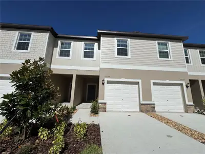 New construction Townhouse house 10149 Trumpet Honeysuckle Wy, Wesley Chapel, FL 33545 - image