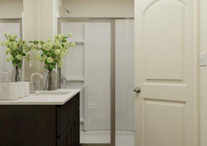 Rendering of the owner's bathroom
  showcasing a large vanity and glass door shower.