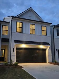 New construction Townhouse house 1941 Westwind St, Lawrenceville, GA 30043 - photo 0