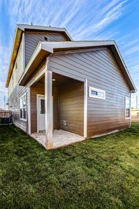 Step into your private oasis! This covered back patio provides the perfect spot for outdoor relaxation or entertaining. Surrounded by a spacious, lush lawn and a fully fenced backyard, it’s perfect for kids, pets, or gardening enthusiasts.