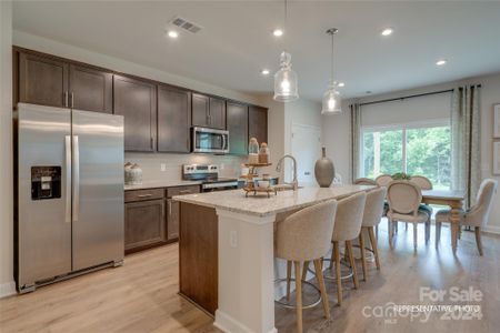 Kitchen floor plan changed on this plan adding a corner pantry.