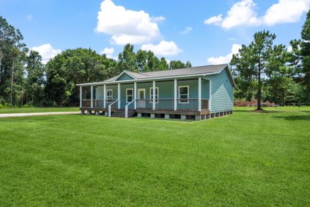 New construction Single-Family house 427 County Rd 306, Cleveland, TX 77327 - image